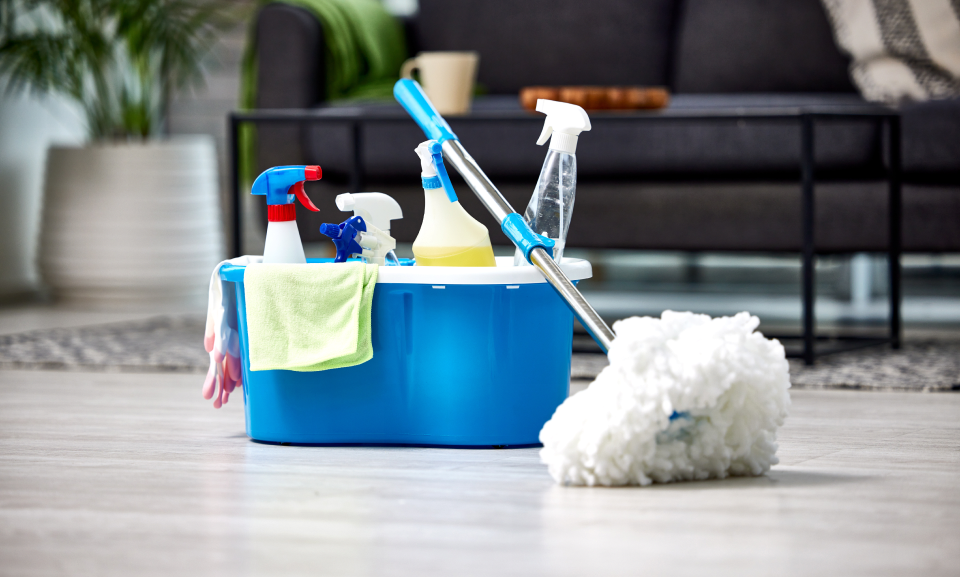 Household cleaning tools in living room
